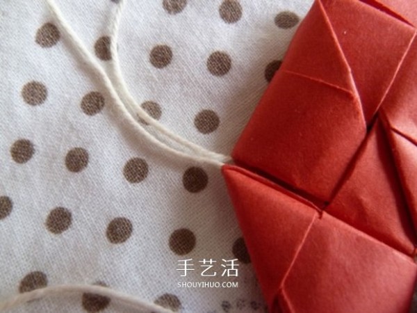 How to fold a thread through a romantic heart. Creative Valentines Day love origami illustration.