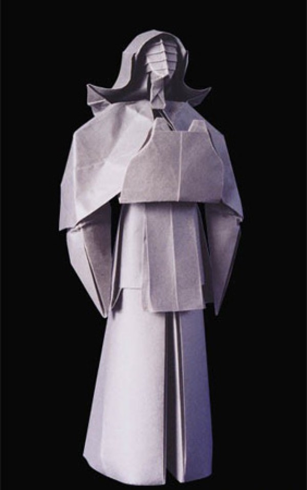 Detailed origami artwork of figures