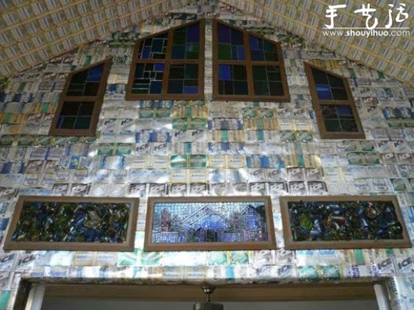 A house decorated with more than 50,000 beer bottles and cans