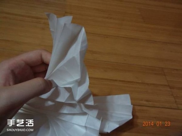 How to fold a paper crane with a step-by-step guide and a tutorial on how to make an origami crane by hand