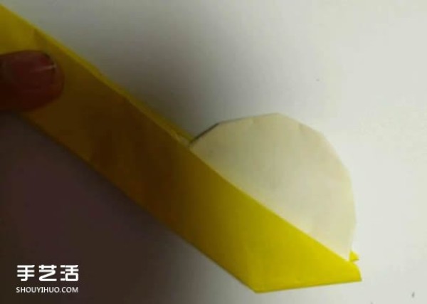 Illustrated tutorial on folding origami yuanxiao including a spoon for holding yuanxiao