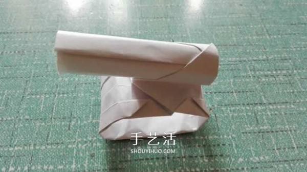 Simple modern weapon origami tutorial with illustrations of how to fold a cute little tank