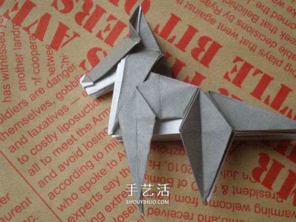 Illustrations of how to fold a cute puppy. Step-by-step pictures of origami puppies.