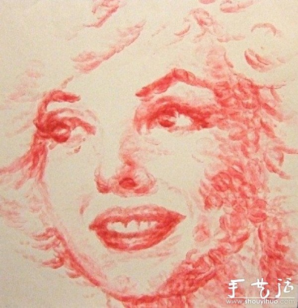 A painting created by lips and lipstick