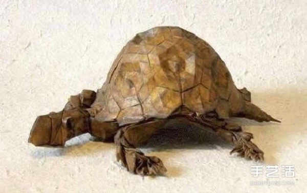 Super difficult origami turtle tutorial with illustrations of folding a realistic three-dimensional turtle