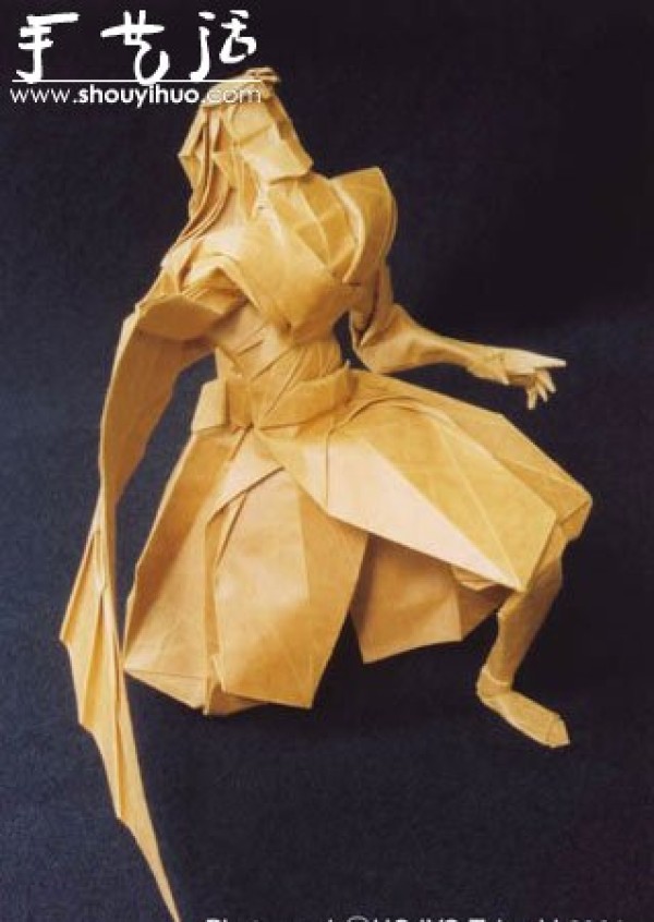 Detailed origami artwork of human figures