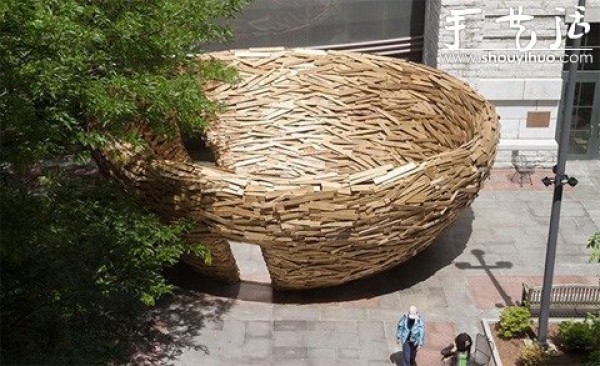 10,000 wooden planks are used to make a DIY birds nest-shaped building