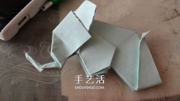 How to fold a three-dimensional elephant with diagrams and instructions for folding origami and a standing elephant