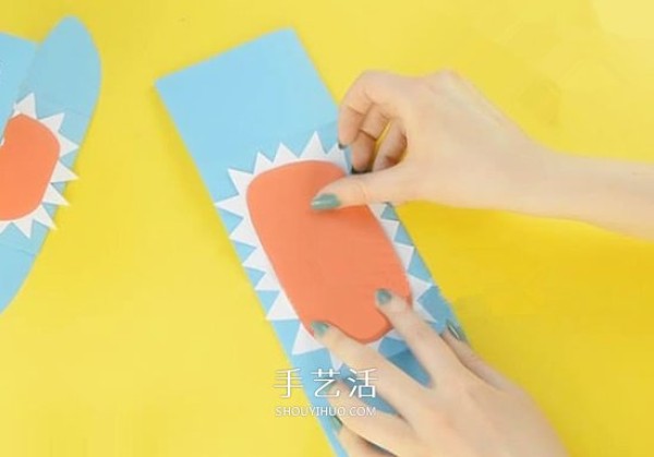 A simple tutorial to make a paper shark and fun origami illustrations of a shark hand puppet