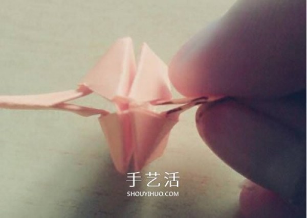 Illustration of how to fold a balloon with wings, origami tutorial of a balloon with wings