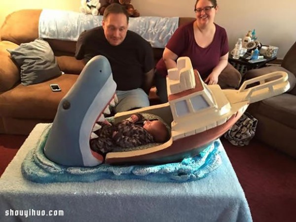 The warmest gift for your nephew is a great white shark engraved crib