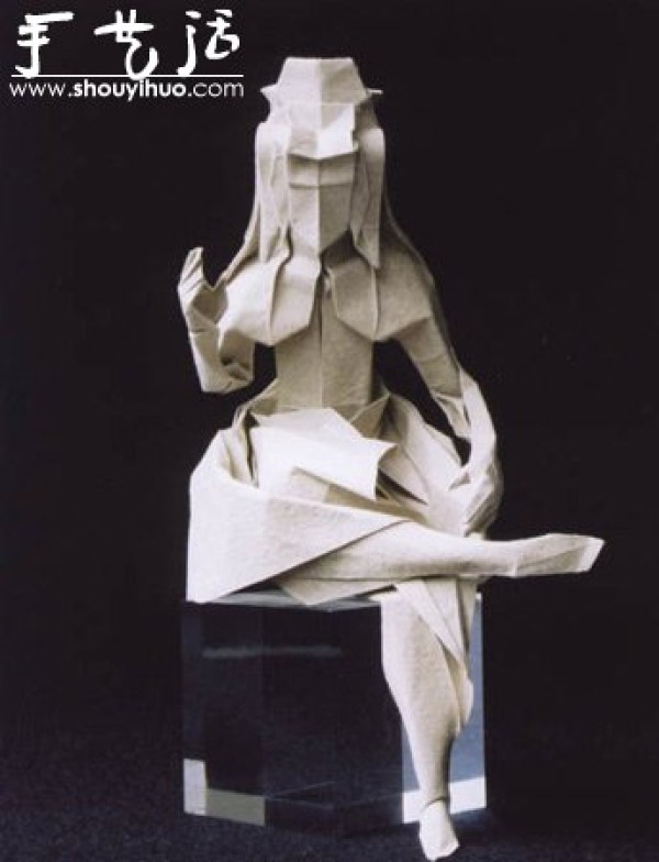 Detailed origami artwork of human figures