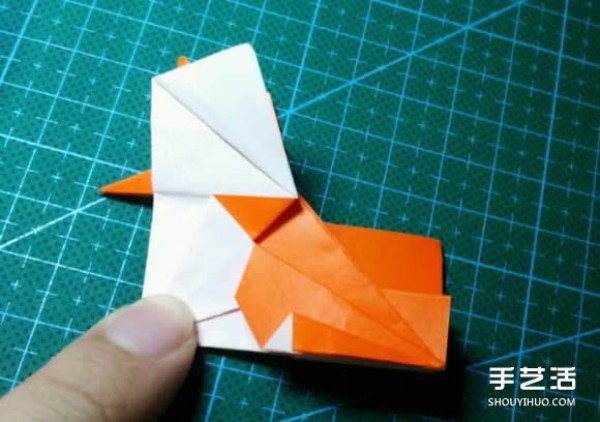 How to make an origami kingfisher with detailed instructions on how to fold a kingfisher