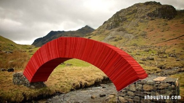 22,000 sheets of paper stacked to create a bridge that requires no glue or nails