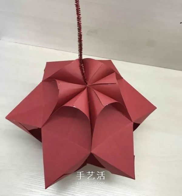 Illustration of making beautiful paper lanterns with small handmade origami for New Years Day