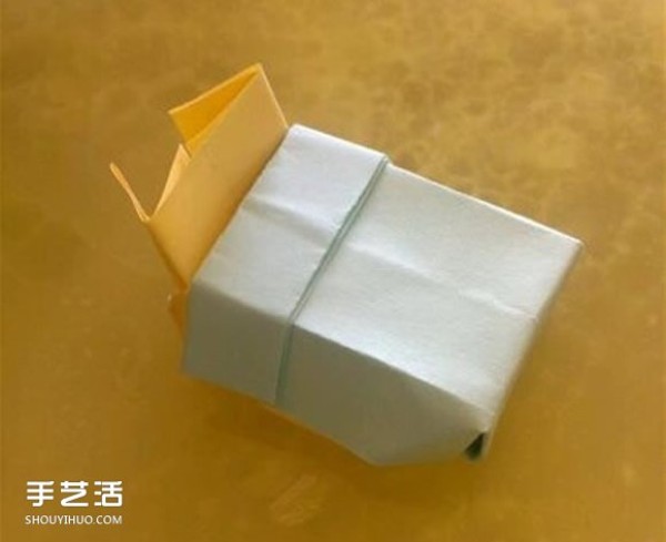 An illustrated tutorial on how to fold a three-dimensional bed, detailed instructions on how to make an origami bed