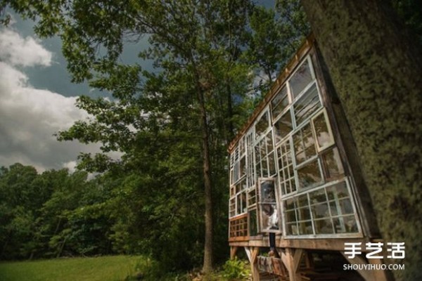 A dreamy lakeside house made up of all kinds of old windows