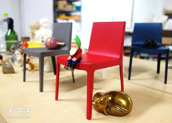 Pictures of handmade origami chairs include a single chair, armchair and sofa