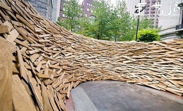 10,000 wooden planks are used to make a DIY birds nest-shaped building