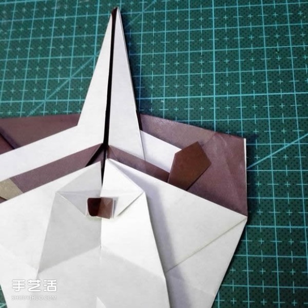 Handmade origami fish fish illustrates how to fold a complex tropical horsefish