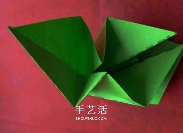 Hand-folding lilies illustrates the steps of folding a simple paper lily