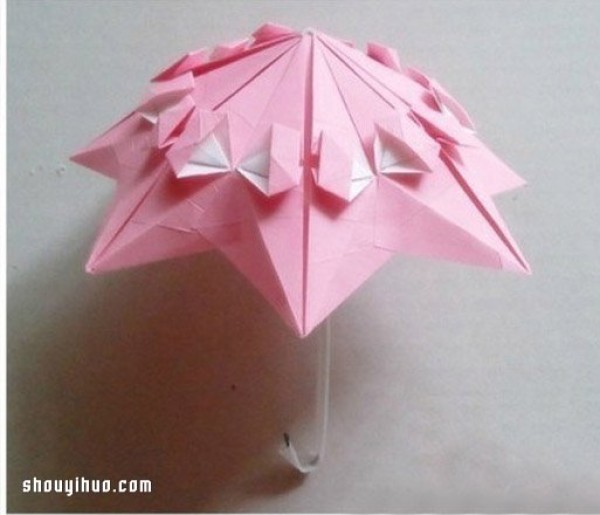 How to fold an origami parasol and illustrate how to make an origami parasol by hand