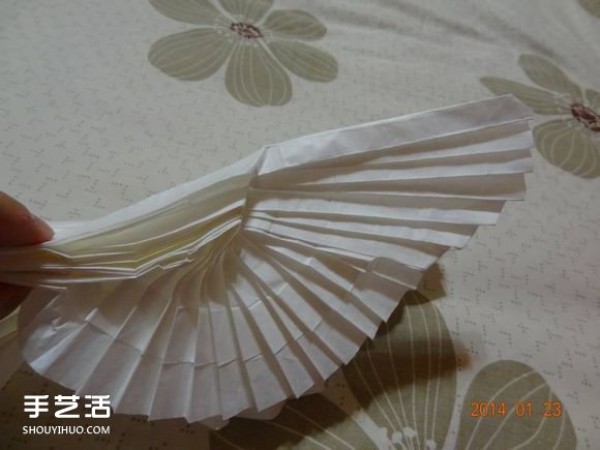 How to fold a paper crane with a step-by-step guide and a tutorial on how to make an origami crane by hand