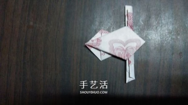 The origami method of the five-petal lotus illustrates the steps of folding the five-petal lotus with paper money