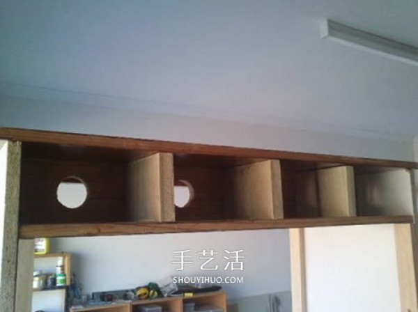 The process of transforming an old bookcase into a bird cabinet and the method of making a homemade wooden bird cabinet