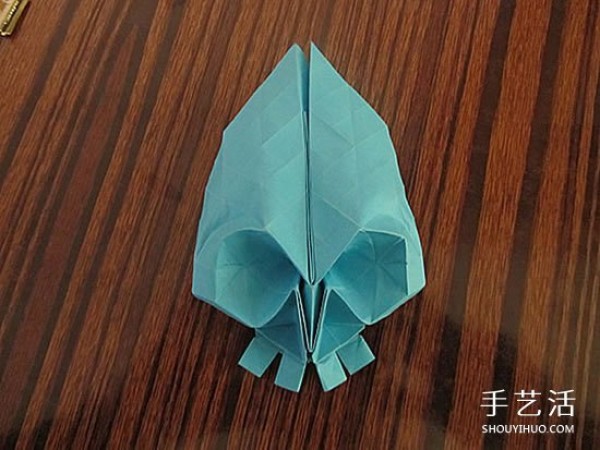 The origami method of the skull illustrates the process of folding the skull