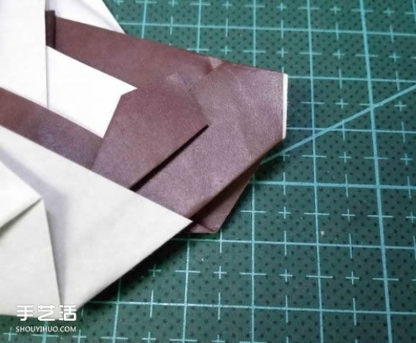 Handmade origami fish fish illustrates how to fold a complex tropical horsefish