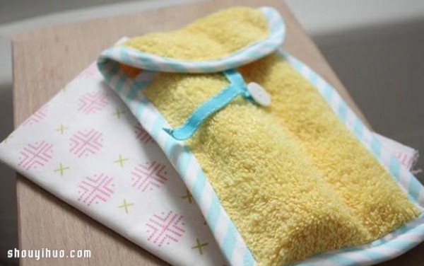 Old towels are repurposed and handmade to make toiletry storage bags