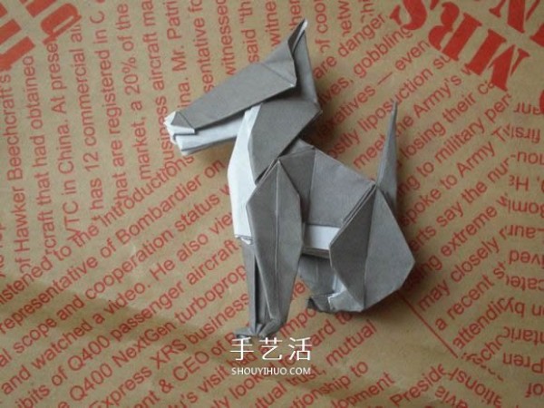 Illustrations of how to fold a cute puppy. Step-by-step pictures of origami puppies.