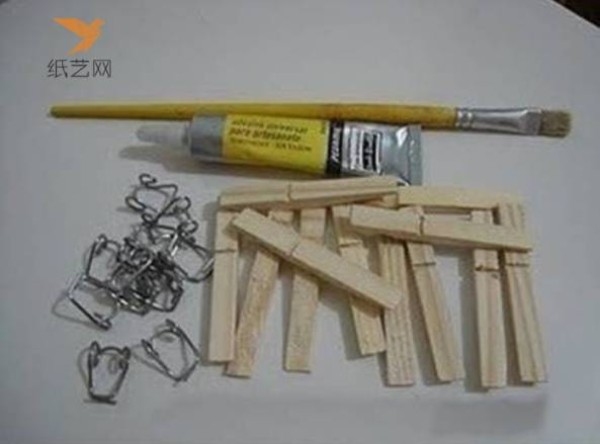 A small wooden chair for dolls made from unused wooden clips in the tutorial on turning waste into treasure