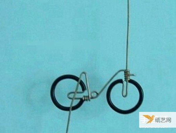 Illustrated tutorial on how to make a bicycle by hand using copper wire