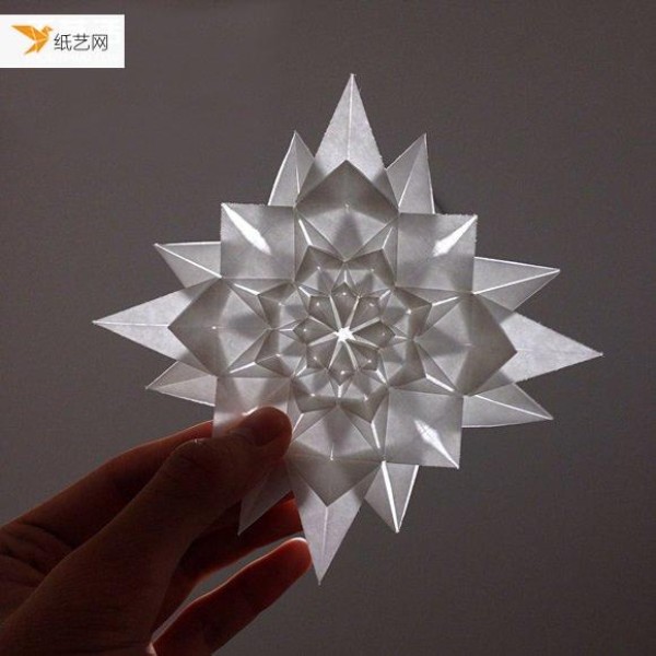 Illustrated steps for folding multi-layered infinite geometric paper flowers