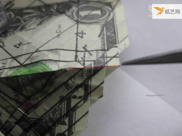 How to fold paper carp using dollars