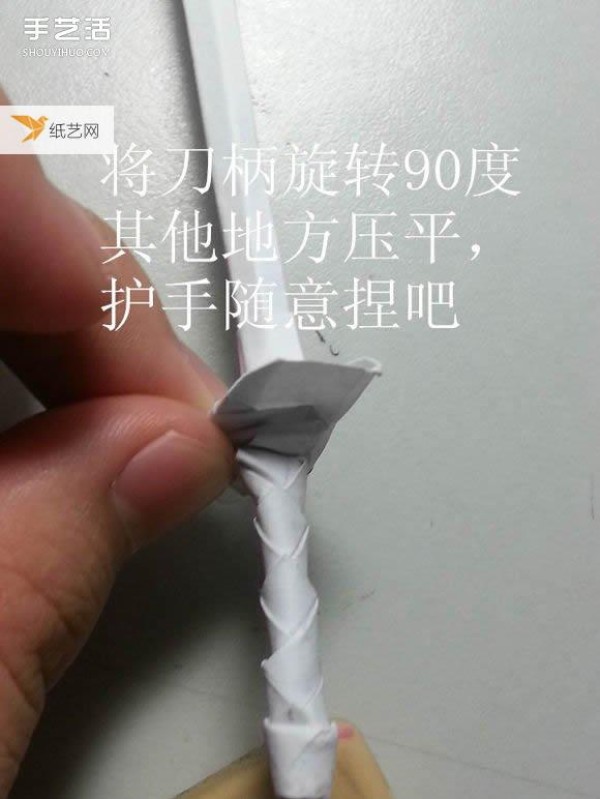 Share a detailed illustration of how to learn to fold a paper katana sword