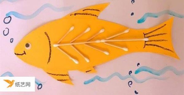 A very simple hand-made method for children to paste fish on cardboard