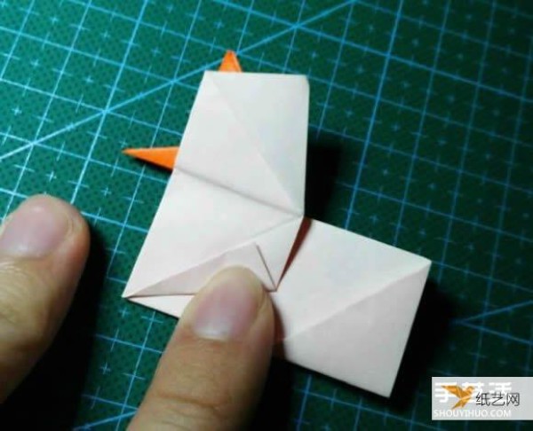 Detailed explanation of the manual method of folding a paper kingfisher tutorial.