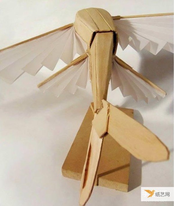 dynamic mechanism made from popsicle sticks and mylar