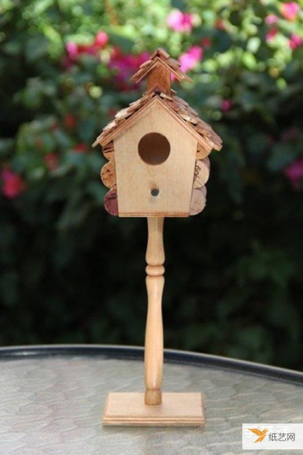 Use waste wine bottle corks to make a cute dollhouse birdcage