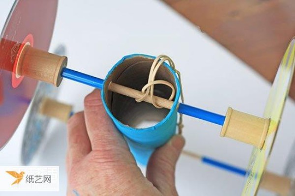 Simple and beautiful step-by-step illustration of the homemade rubber band powered car