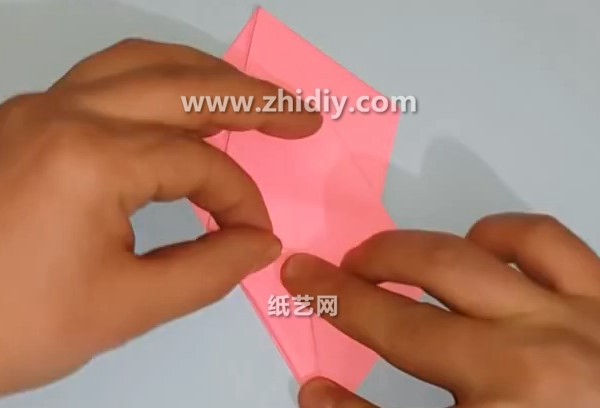 How to fold a three-dimensional origami parrot