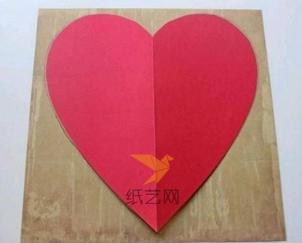 Origami envelope tutorial when folded into an envelope and opened into a heart shape