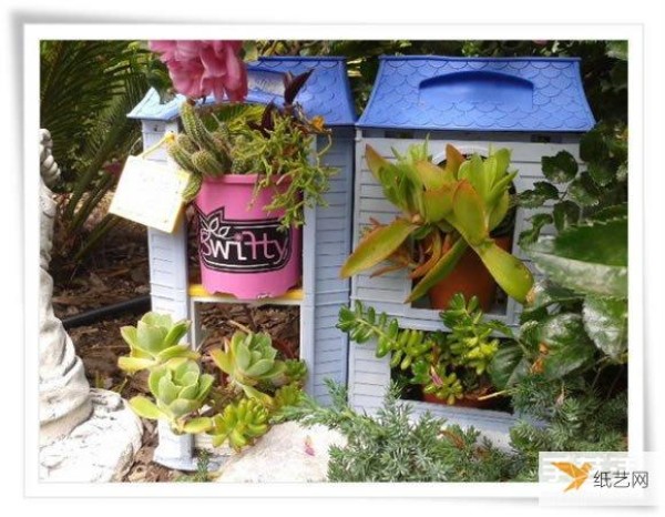 A beautiful miniature garden bonsai made from an old toaster