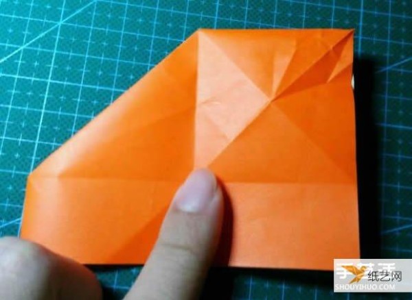 Detailed explanation of the manual method of folding a paper kingfisher tutorial.