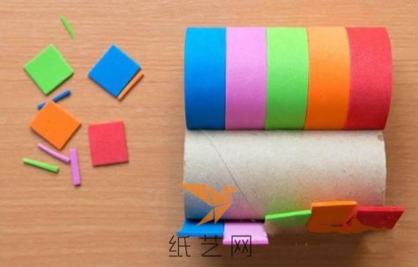 Tutorial on using toilet paper tube waste to make a rainbow telescope toy