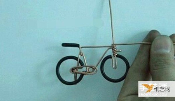 Illustrated tutorial on how to make a bicycle by hand using copper wire