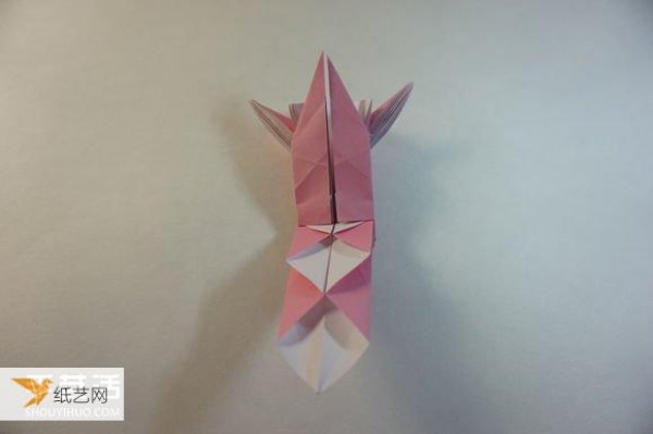 Illustrated step-by-step tutorial for girls using origami to fold something that looks complicated